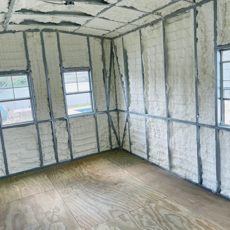 Closed-cell spray foam insulation applied to wall cavities in a residential project in Philomath